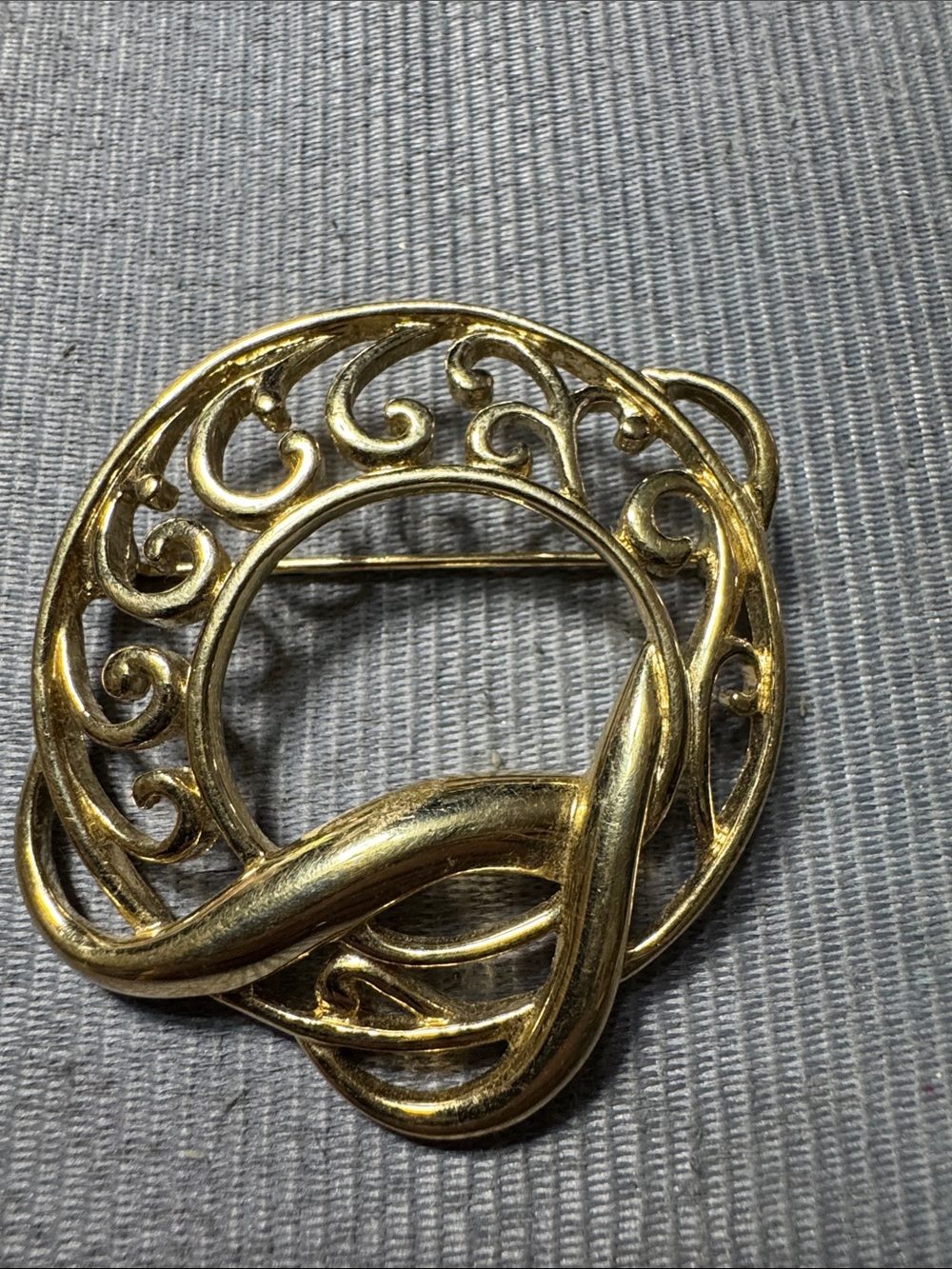 Vintage Trifari Gold-Tone Openwork Swirl Circle Brooch